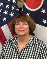 Cheryle Sparks, Billing Department Cheryle Sparks, Billing Department, woman with short brown hair and black and white checkered button up shirt