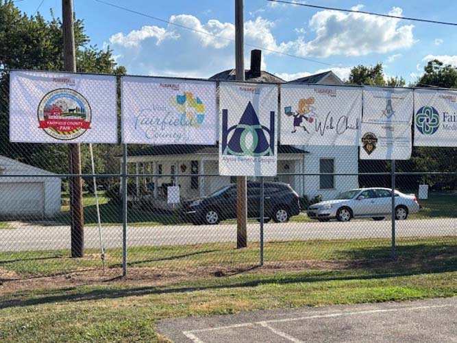 Parade queen with crown and sash