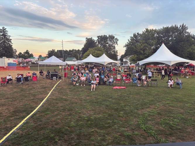 Parade floats moving down street